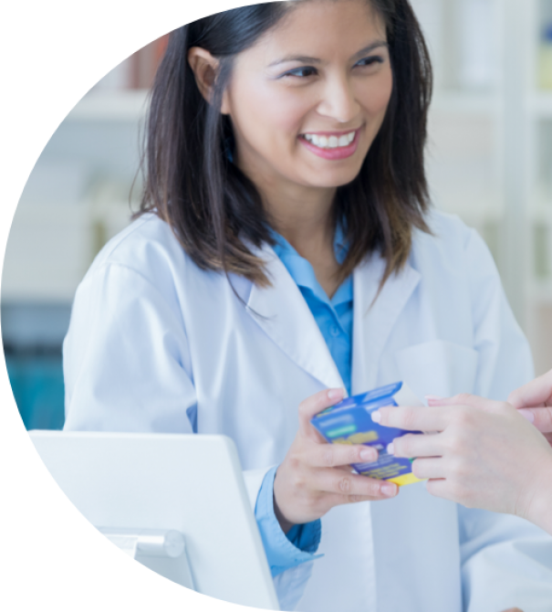 A pharmacist giving a medicine to a client A pharmacist giving a medicine to a client